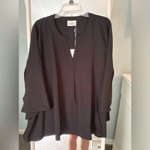 Poncho blouse in black. Will fit a 1X easily.